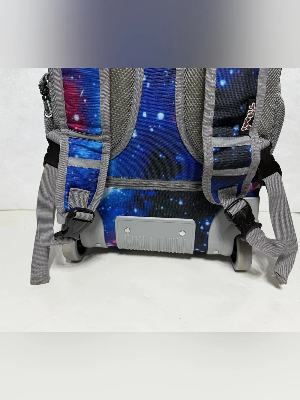 Tilami Deep Blue Galaxy Rolling Backpack 19 inch - pre owned condition